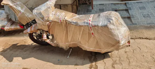Motorcycle covered in multi-layer packing for transport