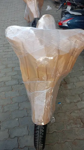 Two-wheeler packed for vehicle transport