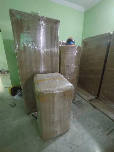 Wardrobe and mattress packed for shifting